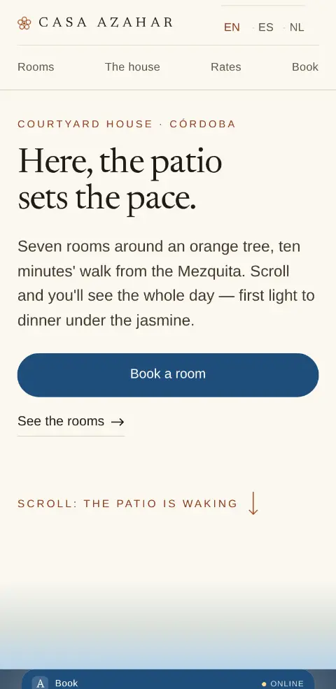 Casa Azahar on a phone screen: the headline “The courtyard runs this house” over pale limewash, the indigo booking button and the courtyard starting just below.